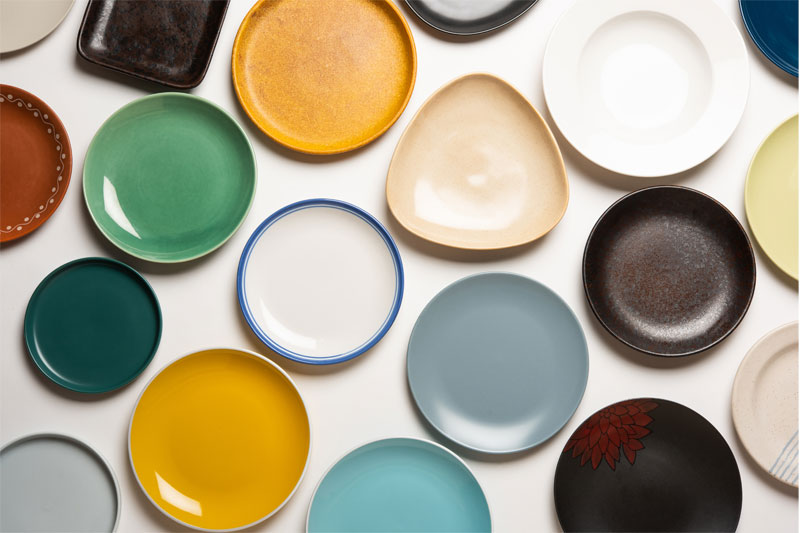 group-of-empty-colourful-ceramic-plates-top-view-2025-01-16-12-40-13-utc colorful dishes