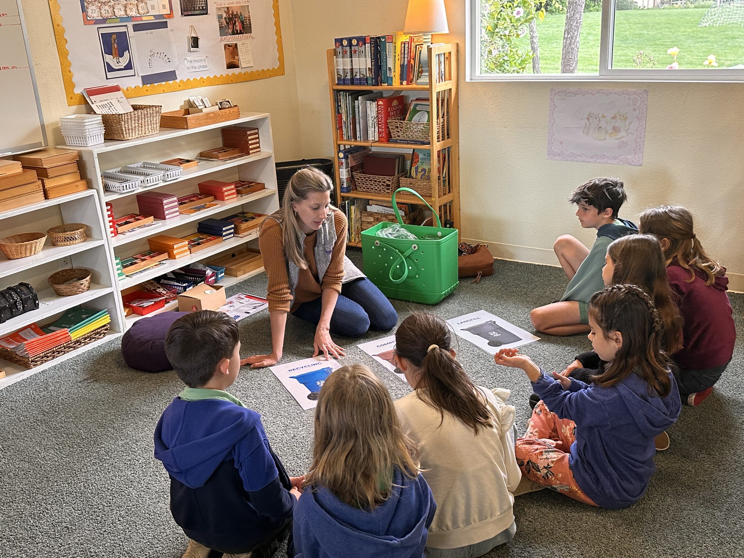 teacher and student recycling in class